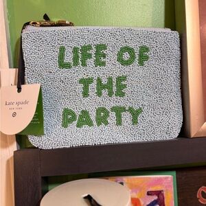 kate spade Light Blue Beaded Pouch with Green Lettering